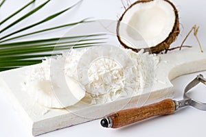 Grated coconut on a wooden board