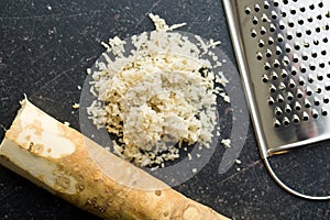 Grated horseradish root photo