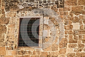 Grated window on southern wall of ancient ruins of Temple Mount wall in Jerusalem