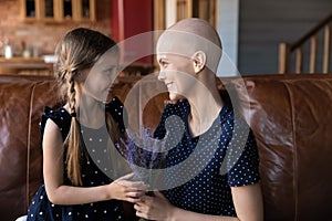 Grateful mom recovering from oncology receiving lavender bunch from child