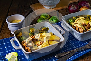 Gratinated Zurich ragout with Brussels sprouts, potatoes and Bearnaise sauce