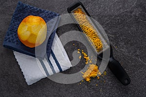 Grating a naval orange for orange zest