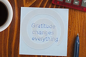 Gratitude changes everything written on a note