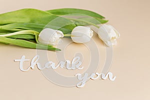 Gratitude Expressed with White Tulips and Thank You Note