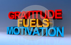 gratitude fuels motivation on blue photo