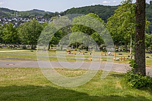 Grave field in a cemetery with gravestones