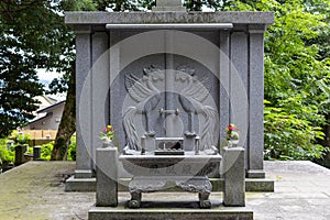 Grave in graveyard, Kanazawa, Japan.TRANSLATION: Palace of the phoenix photo