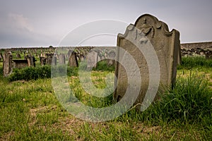 Grave stone at Whitby Abbey, England