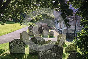 Grave yard in front of an old church in England UK