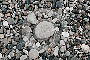 Gravel pattern of wet colored stones. Abstract nature pebbles background. Stone background. Sea peblles beach. Top view