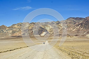 Gravel road at badwater basin in death valley national park