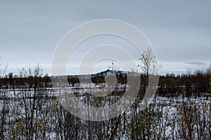 A gravel road in Kiruna, Swedish Lapland next to the Airport.