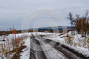 A gravel road in Kiruna, Swedish Lapland next to the Airport.