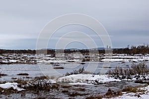 A gravel road in Kiruna, Swedish Lapland next to the Airport.