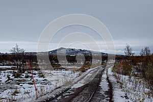 A gravel road in Kiruna, Swedish Lapland next to the Airport.