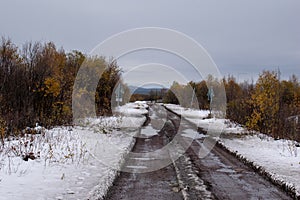 A gravel road in Kiruna, Swedish Lapland next to the Airport.