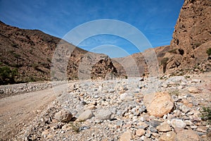 Gravel road and landscape in Oman`s Wadi Arbiyeen