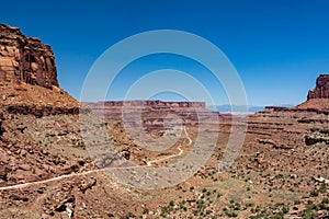 Gravel road leading to canyon, Canyonlands National Park Utah USA