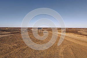 Gravel road off the Oodnadatta Track in the Outback of South Australia near Lake Eyre photo