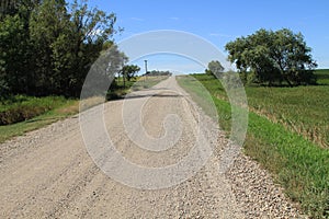 Gravel road on a partly cloudy South Dakota day photo