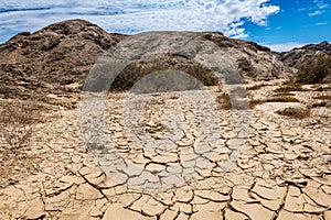 Gravel road in the valley of the dry Swakop River, Namibia