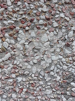 Gravel texture. Gravel background of black and white stones. Gravel grunge texture. Abstract pebble stone. Terrazzo floor.