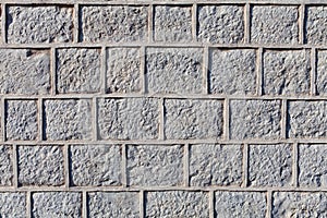 Graven stone blocks or bricks surface with cement grout