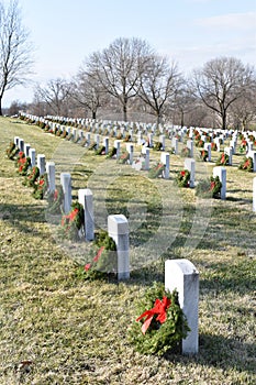 Graves decorated for Wreaths Across America Jefferson Barracks National Cemetery