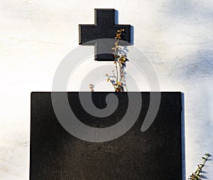 Gravestone scene with dark marble stone