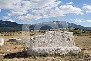 Gravestone on tableland Dugo Polje