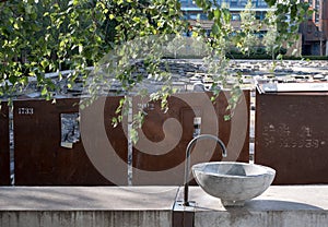 Gravestones at Novo Cemetery, historic Sephardi Jewish burial ground in Mile End. Moss grows on Hebrew lettering photo