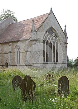 Gravestones in an overgrown Churchyard