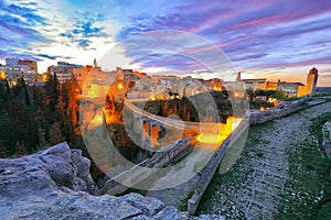 Gravina in Puglia ancient town, bridge and canyon at sunrise