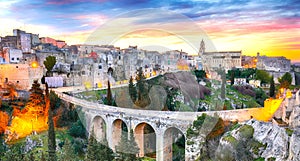 Gravina in Puglia ancient town, bridge and canyon at sunrise