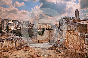 Gravina in Puglia, Bari, Italy: landscape at sunrise of the old town seen from the entrance of the ancient aqueduct bridge