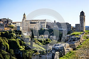 Gravina in Puglia: picturesque landscape of the the deep ravine and the old town with the ancient cathedral, Bari, Apulia, Italy