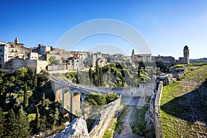 Gravina in Puglia, with the Roman two-level bridge that extends over the canyon. Apulia, Italy