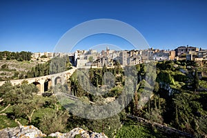 Gravina in Puglia, with the Roman two-level bridge that extends over the canyon. Bari, Apulia, Italy