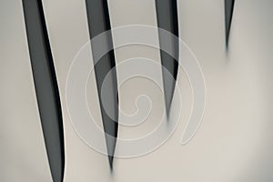 gray abstract background from curved lines of geometric shapes