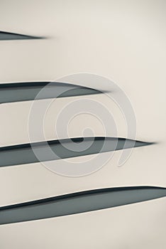 gray abstract background from curved lines of geometric shapes