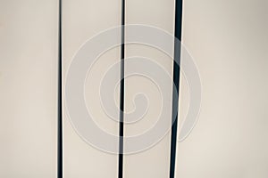 gray abstract background from curved lines of geometric shapes