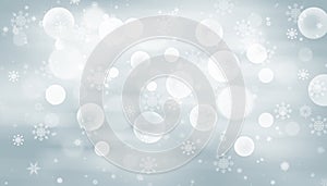 Gray abstract background. white light and snowflakes bokeh winter for Christmas new year blurred beautiful shiny lights