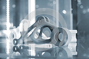 Gray abstract model object printed on 3d printer from powder close-up