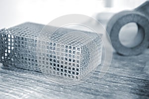 Gray abstract model object printed on 3d printer from powder close-up