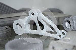 Gray abstract model object printed on 3d printer from powder close-up