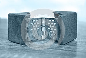 Gray abstract model object printed on 3d printer from powder close-up.