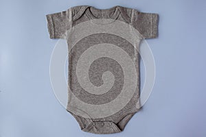 Gray baby bodysuit mock up on a blue background