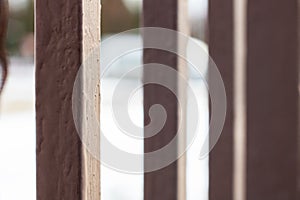 Gray bars of the fence close up, macro photo