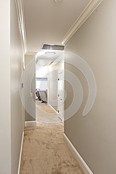 A gray beige greige hallway in a new construction house