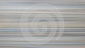 Gray-beige horizontal striped surface photo